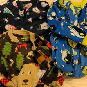 Bundle of 3 long sleeve, footed fleece pajamas